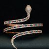Pulsera brazalete de plata chapada en oro rosa forma de serpiente con circonitas multicolor